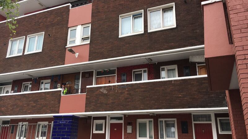 A garda at the flats complex where Michael Keogh lived. Photograph: Sorcha Pollak