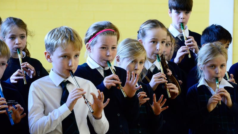 Pupils at Gaelscoil Thaobh na Coille, Stepaside during a music class. Photograph: Cyril Byrne/The Irish Times