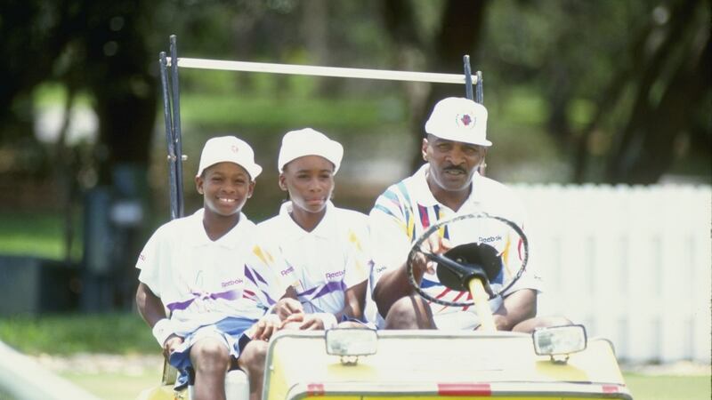 Serena Williams and her sister Venus  ride a buggy with their father Richard  at a tennis camp in Florida in 1992. Mandatory Credit: Ken Levine/Allsport