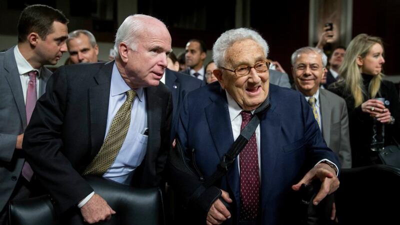 Henry Kissinger, former secretary of state, right,  talking with Senator John McCain, a Republican from Arizona, after a Senate Armed Services Committee hearing in Washington, D.C. Photograph: Andrew Harrer/Bloomberg.