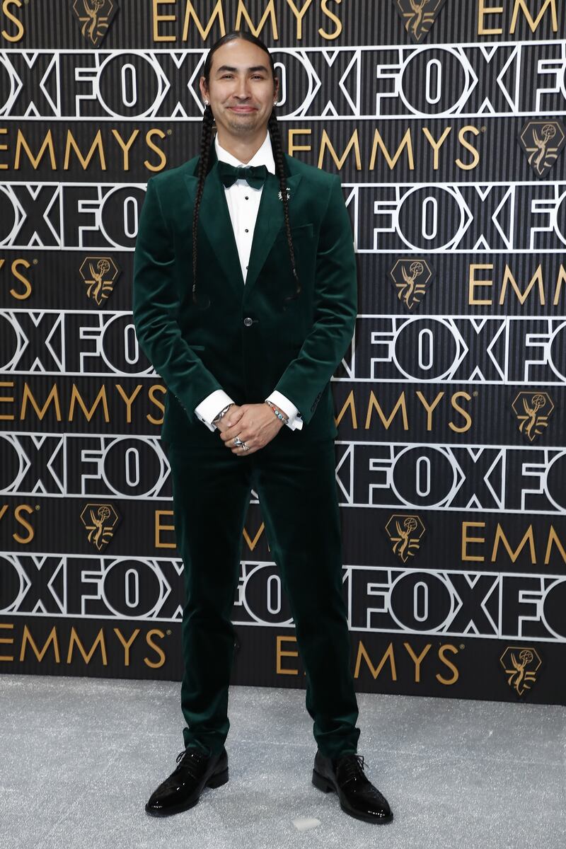 Tatanka Means from the movie Killers of the Moon arrives in a green velvet tuxedo. Photograph: Caroline Brehman/Shutterstock