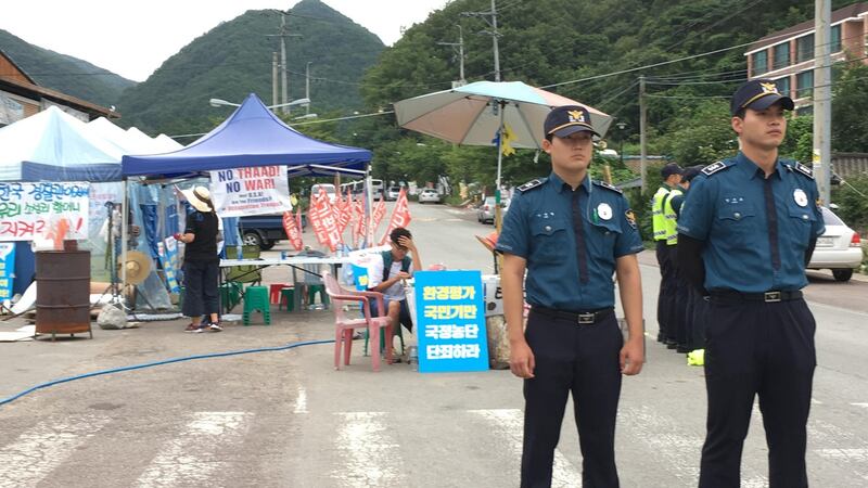 Police are a permanent feature at the anti-Thaad protest camp at Soseong-gil in south central South Korea. Photograph: Peter Murtagh