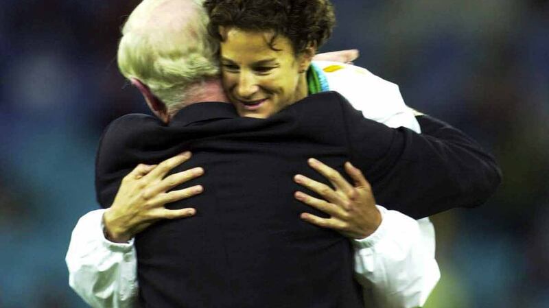 Sonia O’Sullivan embraces Pat Hickey after  he presented her with the silver medal she won in the Women’s 5000m final at the 2000 Olympic Games in Sydney. Photograph: Eric Luke/The Irish Times..