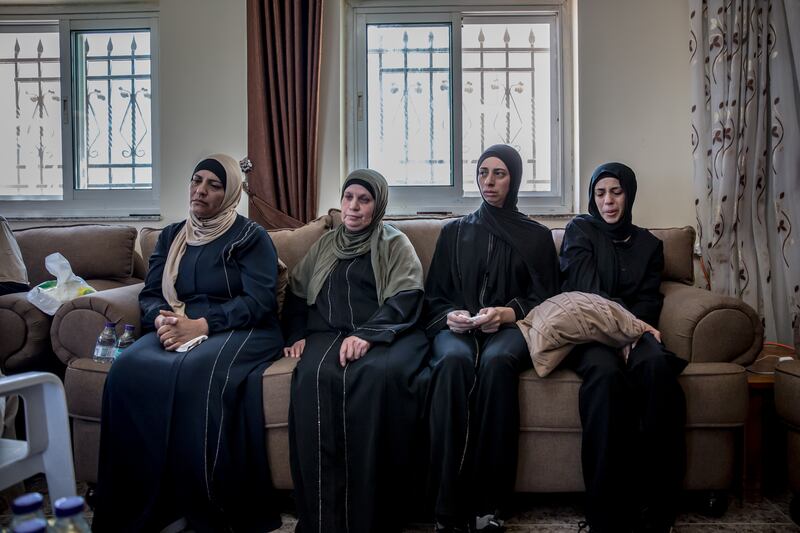 Relatives of Mohammed Hussein Al-Shalabi (23) gather to mourn together the day after his death. Photograph: Sally Hayden