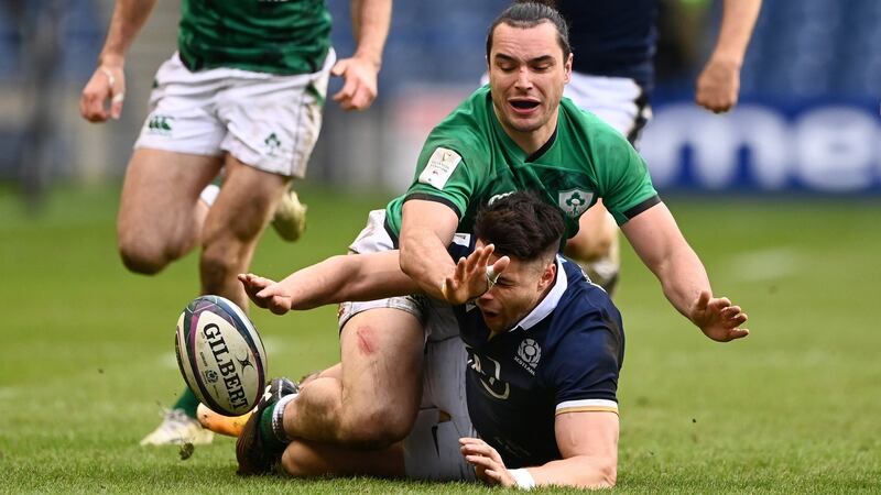 James Lowe  and Scotland’s Sean Maitland compete for a loose ball during the  Six Nations match at Murrayfield. Photograph: Stu Forster/Getty Images