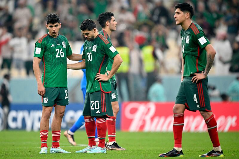 Mexico's defender Kevin Alvarez and Mexico's forward Henry Martin after going out of the World Cup. Photograph: Alfredo Estrella/AFP via Getty