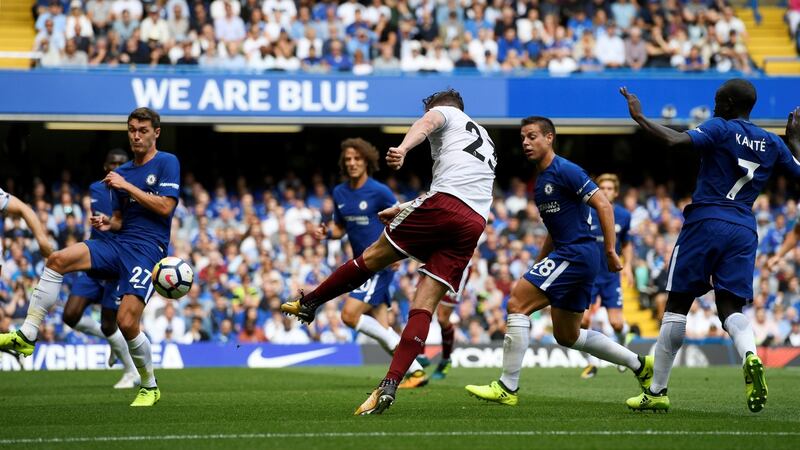 Burnley’s Stephen Ward scores their second goal. Photograph: Tony O’Brien/Reuters