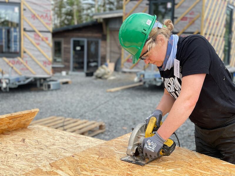Learning to use power tools at the build school. Photograph: Common Knowledge