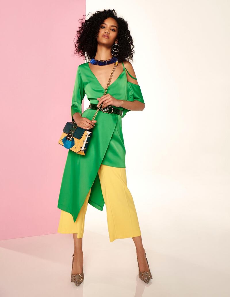 Emerald top €87, cropped trousers €50, earrings €10, bag €45, shoes €55, all from River Island