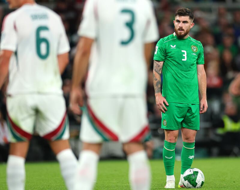 Ireland's Ryan Manning prepared for a free-kick. Photograph: James Crombie/Inpho