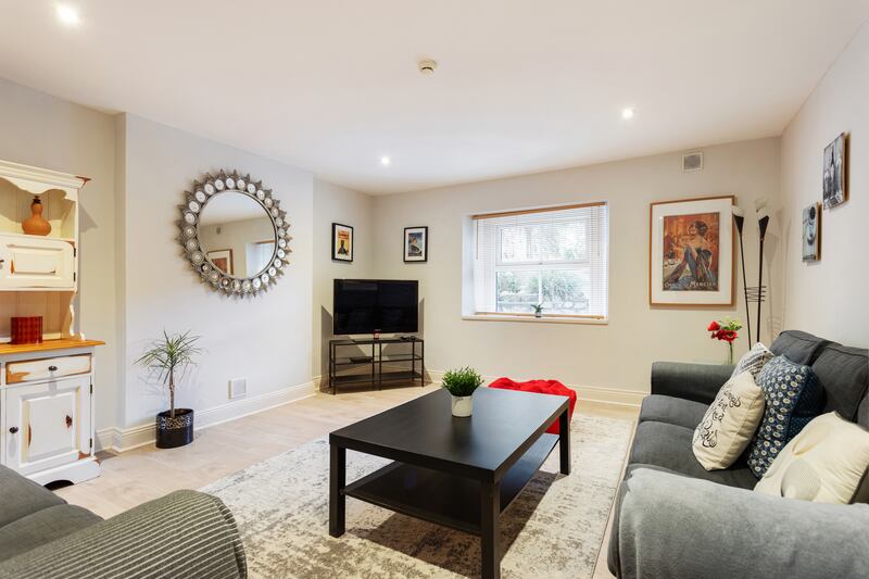 The basement livingroom. Photograph: Alex Urdaneta