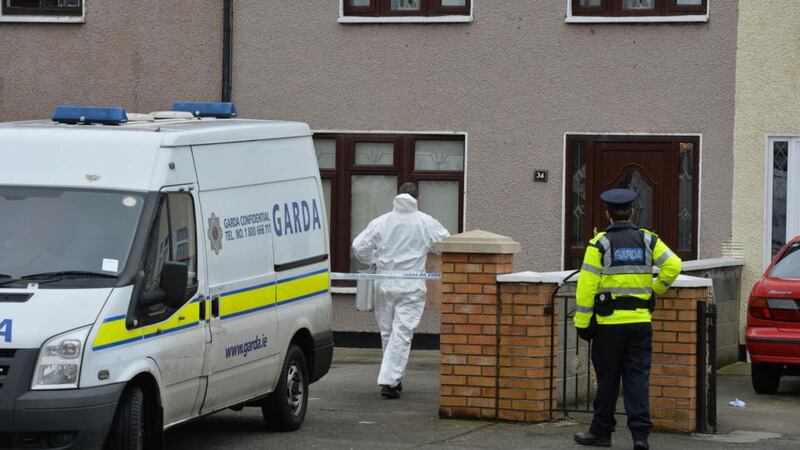 Gardai outside the house on Greensfort Crescent in Clondalkin where John Gilligan was shot while attending a family gathering last night. Photograph: Alan Betson/The Irish Times