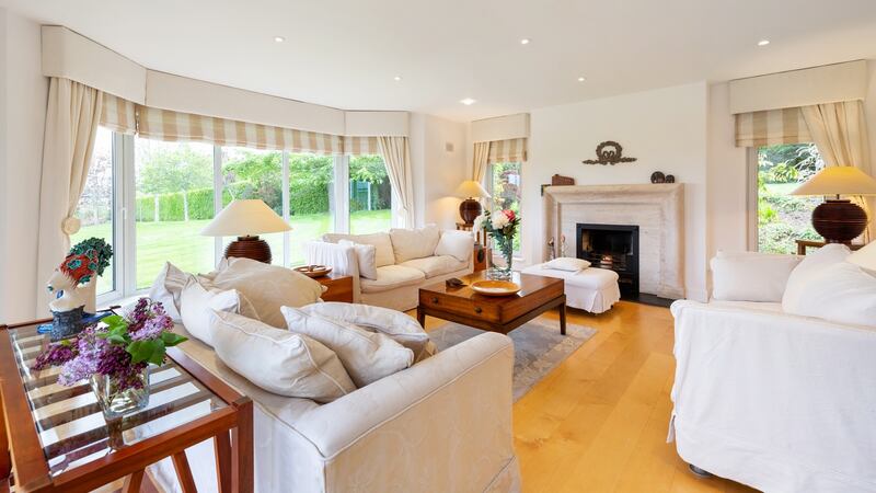 The  walls are painted mostly white, floors are either wide-plank oak or travertine tiles, and the fit-out is both simple and sophisticated, with a slightly French flavour