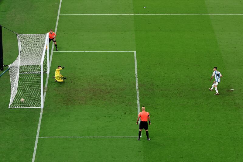 Gonzalo Montiel slots home the penalty that confirmed Argentina's victory and, perhaps, the perfect farewell for Lionel Messi. Photograph: Buda Mendes/Getty Images