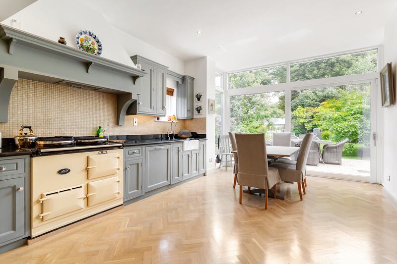 The kitchen is part of the modern extension and features an Aga. Photograph: Keith Owens