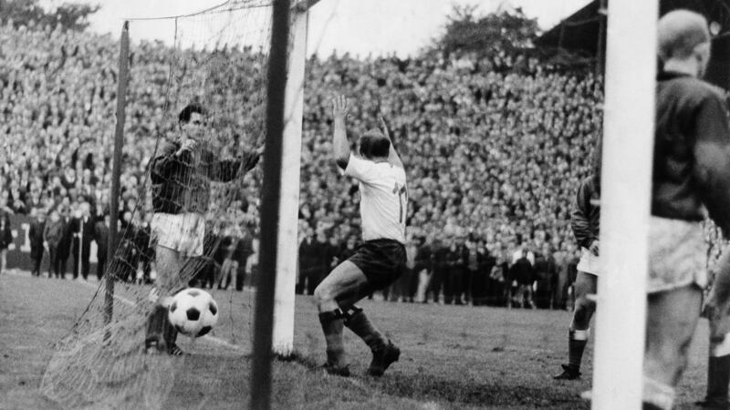 Gert ’Charly’ Dörfel  scoring for Hamburg in their inaugural Bundesliga game against Prussia Münster in August 1963. Photograph:  Volgmann/Ullstein Bild, via Getty Images