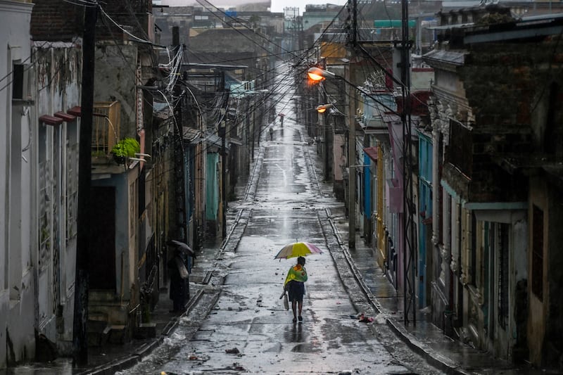 Residents in the city of Santiago de Cuba are braced for the arrival of the hurricane. Photograph: Yamil Lage/AFP via Getty Images        