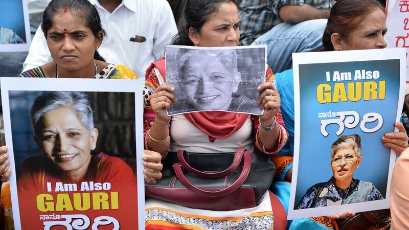 Protesters take part in a rally in Bengaluru on Wednesday condemning the murder of journalist Gauri Lankesh. Photograph: Manjunath Kiran/AFP/Getty Images