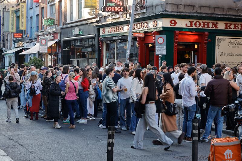 People enjoy warm weather, alfresco dining and beverages outside Kehoe's pub on South Anne street. Photograph: Alan Betson 