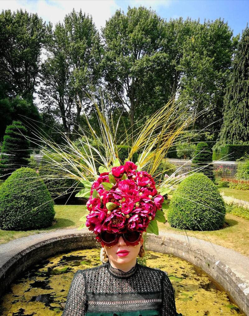 Crimson Boom: novelty party glasses and crimson tinted lenses constructed with garden wire, woven gold sprigs, feathers and gold beads. Photograph: Edward Keegan