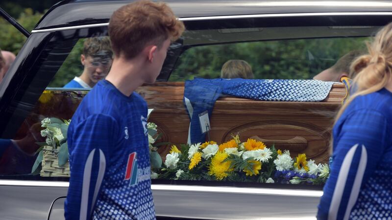 The cortege leaves Beaufort Parish Church, near Killarney in Co Kerry. Photograph: Don MacMonagle