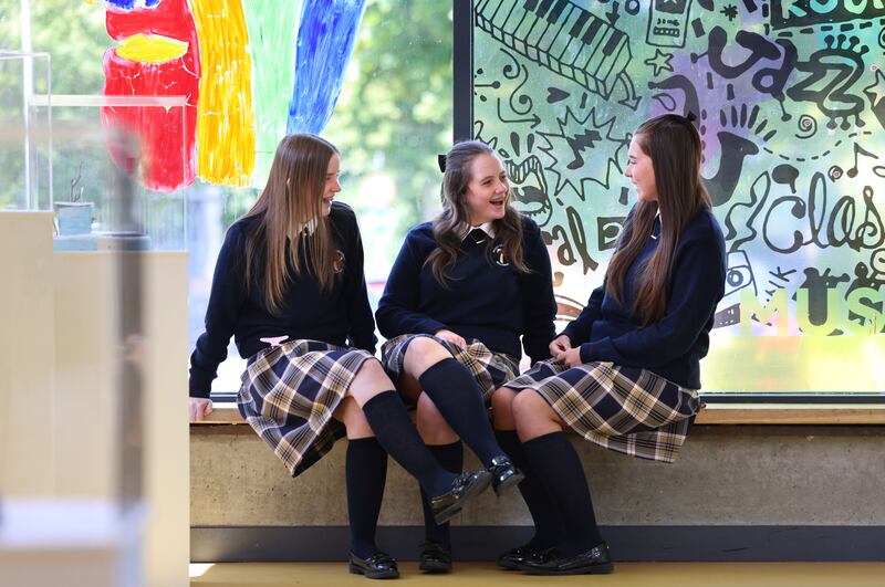 Leaving Cert students Sarah Daly, Kelsey Scully and Sophie Williams, after English paper one at Trinity Comprehensive School, Ballymun, Dublin. Photograph: Dara Mac Dónaill







