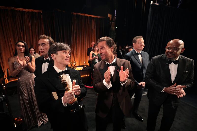 Cillian Murphy and Matthew McConaughey share a joke backstage as Forest Whitaker looks on.  Photograph: Al Seib/AMPAS/Getty Images
