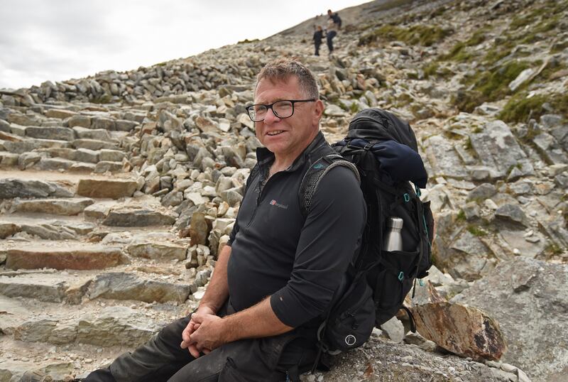 Matt McConway on his way down Croagh Patrick after working on the pathway to the summit in 2021. Photograph: Conor McKeown

