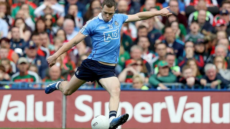 Dublin’s Dean Rock scores the winning point in the All-Ireland final against Mayo at Croke Park. Photograph: Tommy Dickson/Inpho