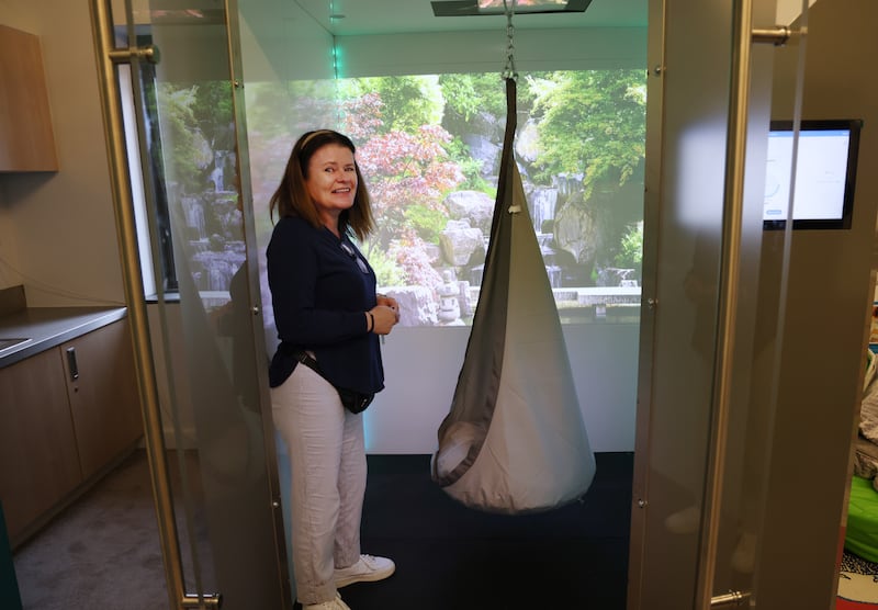 Jacqui McCarron, principal of the school at Crannóg Nua special care unit, stands next to a 'cubbie' unit, a multi-sensory calming booth. Photograph: Bryan O’Brien