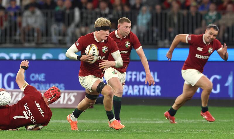 Henry Pollock breaks clear to set up the Lions' second try, scored by Tomos Williams, during the tour match against Western Force. Photograph: David Rogers/Getty Images)