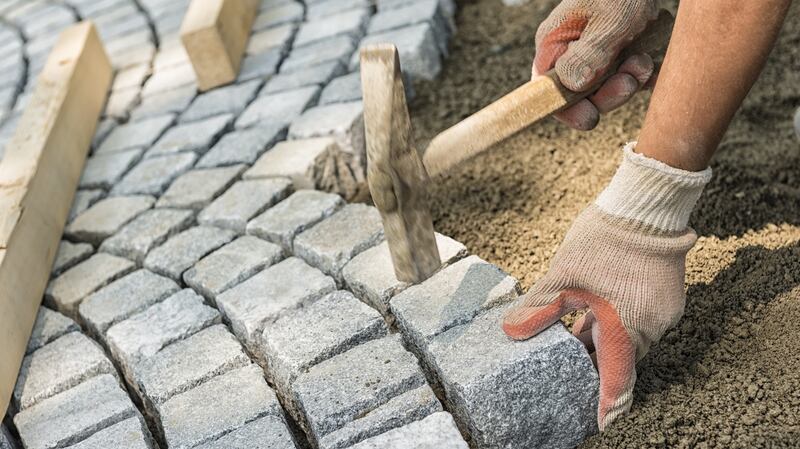 Materials such as stone paving, which used to cost €30 per sq m now costs €42, an increase of over 28 per cent, says quantity surveyor Patricia Power. Photograph: iStock