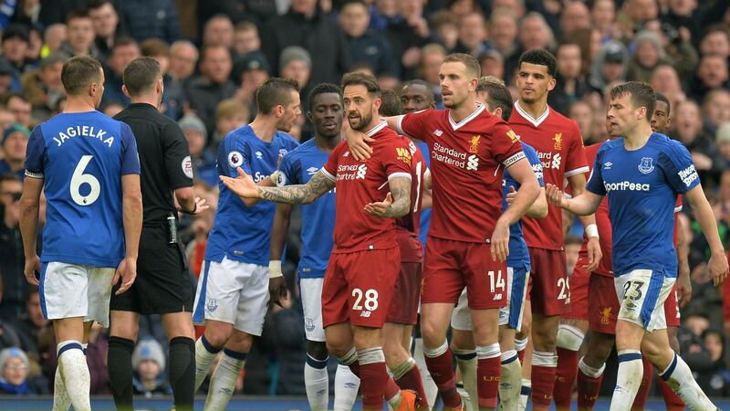 Tempers flare during the Merseyside derby. Photograph: Peter Powell/Reuters