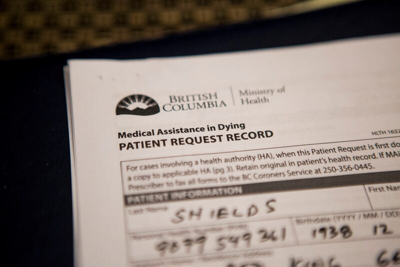 Paperwork signed by John Shields, affirming that he wished to die. Shields believed that dying openly and without fear could be his most meaningful legacy, after a lifetime of public service as a civil rights activist, social worker, union leader and more. Photograph: Leslye Davis/The New York Times