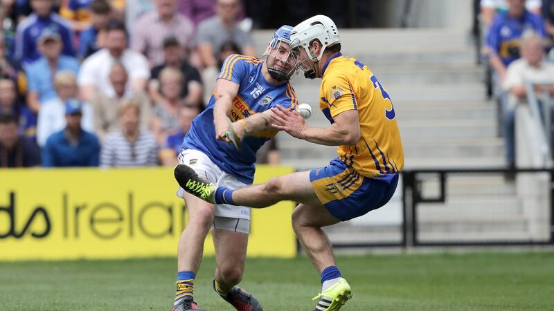 lare’s Patrick O’Connor blocks a John McGrath effort. Photograph: Morgan Treacy/Inpho