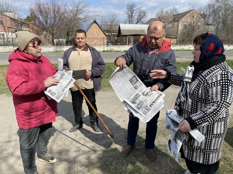 Oleksiy Pasyuha, chief editor of the Vorskla newspaper, handing out copies in Velyka Pysarivka, a village in northeastern Ukraine. Photograph: Courtesy of Oleksiy Pasyuha