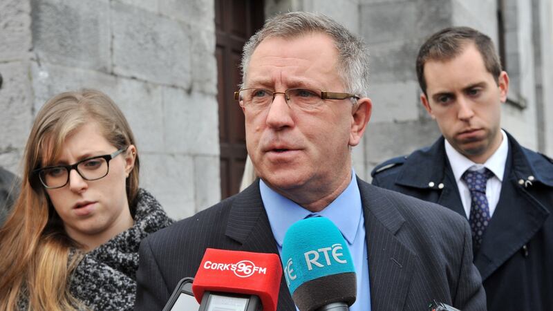 Noel Clancy, flanked by his daughter Fiona and son Delan pictured at Mallow Coroner’s Court, Co Cork, following the inquest into the death of his wife and daughter Geraldine and Louise Clancy. Photograph: Daragh McSweeney/Cork Courts