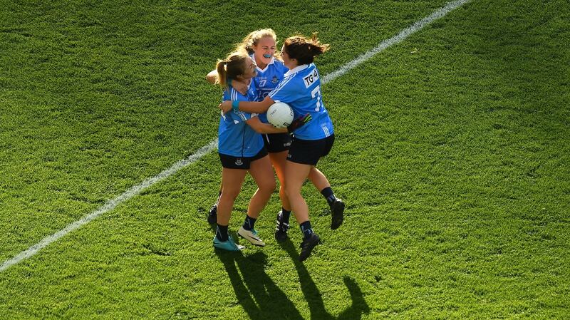 Dublin’s Sinéad Finnegan, Amy Connolly, and Niamh Collins celebrate their side’s win over Cork. Photograph: Piaras Ó Mídheach/Sportsfile