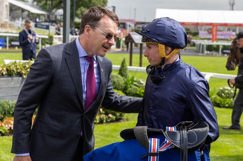 Ryan Moore and trainer Aidan O’Brien after City of Troy's maiden win in the Barronstown Stud Irish EBF Maiden at the Curragh. Photograph; Morgan Treacy/Inpho 
