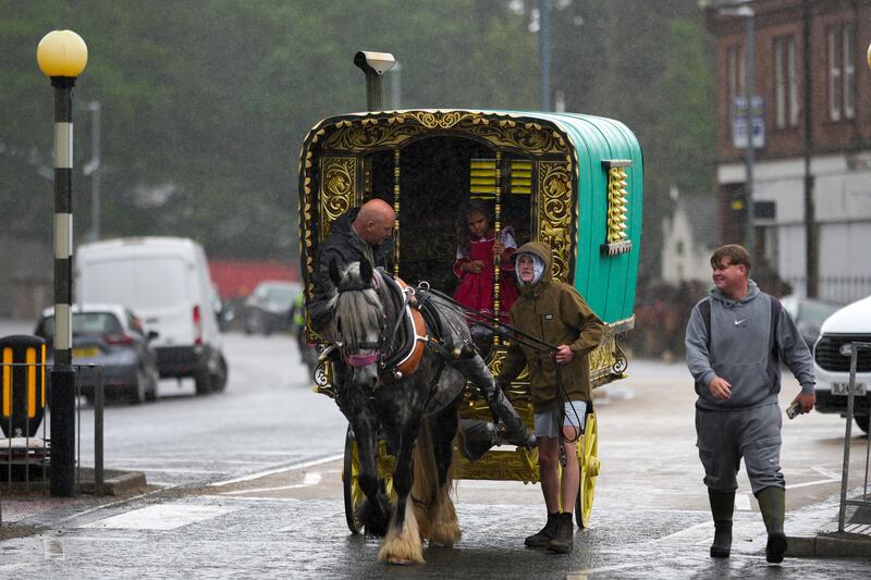 A traditional horse-drawn caravan makes its way to the annual Appleby Horse Fair. Photograph: Christopher Furlong/Getty Images