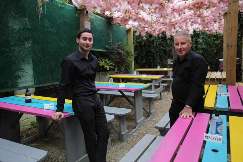 Sam O'Loughlin (left) and his father Michael O'Loughlin in their pub O'Loughlin's on George’s Street Lower in Dún Laoghaire. Photograph: Bryan O’Brien