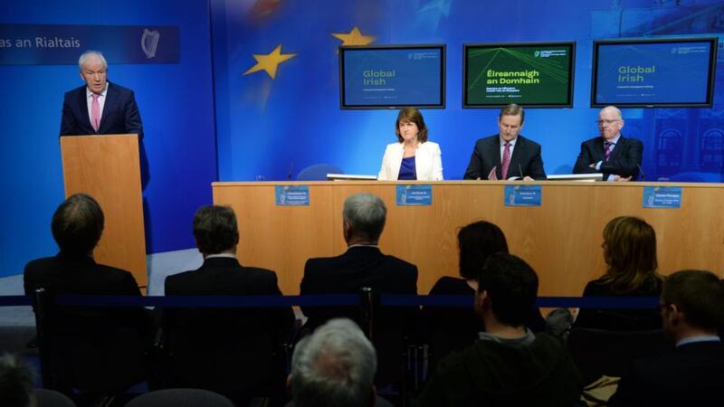 Taoiseach Enda Kenny, Tánaiste Joan Burton, Minister for Foreign Affairs and Trade Charlie Flanagan, and Minister for the Diaspora, Jimmy Deenihan  at the launch of Global Irish: Ireland’s Diaspora Policy at Government Buildings. Photograph: Dara Mac Dónaill / The Irish Times