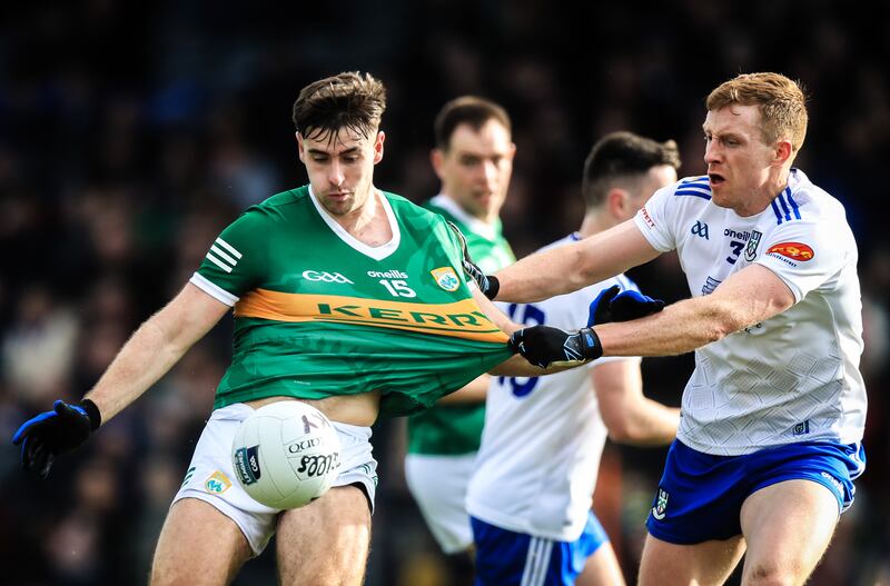 Kerry's Donal O'Sullivan with Kieran Duffy of Monaghan. Photograph: Evan Treacy/Inpho