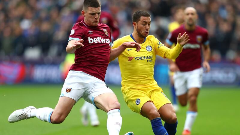Declan Rice tackles Eden Hazard during West Ham’s goalless draw with Chelsea. Photograph: Dean Mouhtaropoulos/Getty