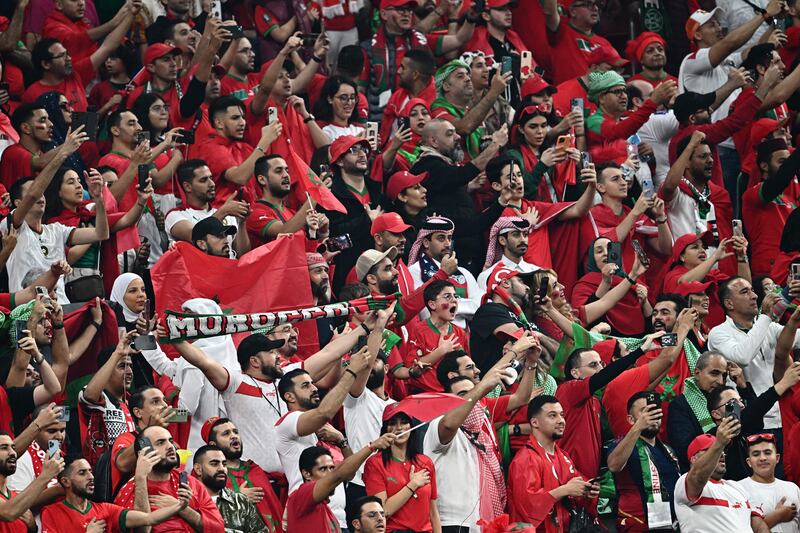 Supporters of Morocco listening to their national anthem. Photograph: Gabriel Bouys/AFP via Getty