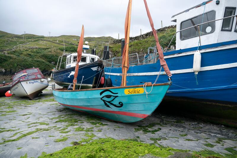 Boats at high tide in the port at Inishturk Island, off the coast of Mayo. Photograph: Chris Maddaloni
