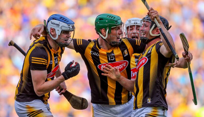 Kilkenny's TJ Reid, Eoin Cody and Mikey Butler celebrate at the final whistle. Photograph: Bryan Keane/Inpho 