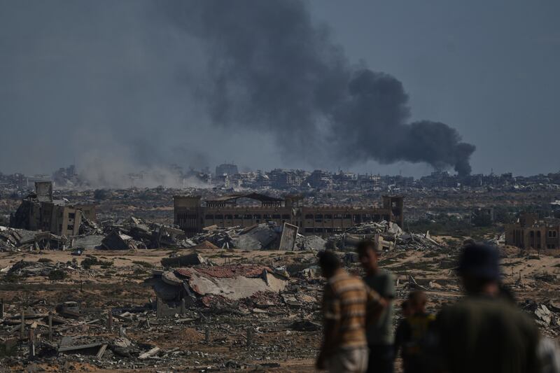 Smoke rises following an Israeli military strike in Gaza City on Thursday. Photograph: Abdel Kareem Hana/AP