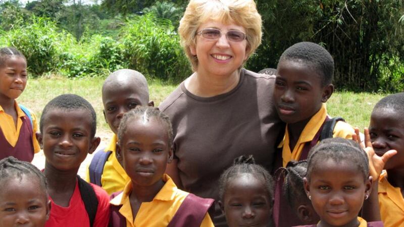Nancy Writebol with children in Liberia in October 2013. She is one of two Americans working for a missionary group in Liberia who were infected with the Ebola virus, and who have been discharged from Emory University Hospital in Atlanta after receiving treatment. Photograph: AP courtesy Jeremy Writebol