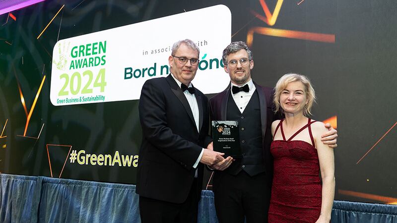 Paul O'Brien, group corporate account manager at Panda, presents 
the green medium-sized organisation of the year award to Paul Coote and Louise McCormack, Hotel Doolin